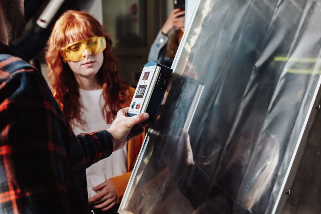 Person standing indoors googles 